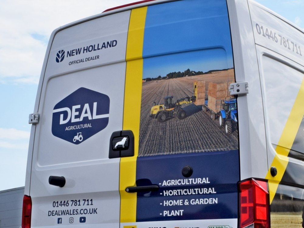 Close up of rear vehicle wrap on MAN TGE company van.