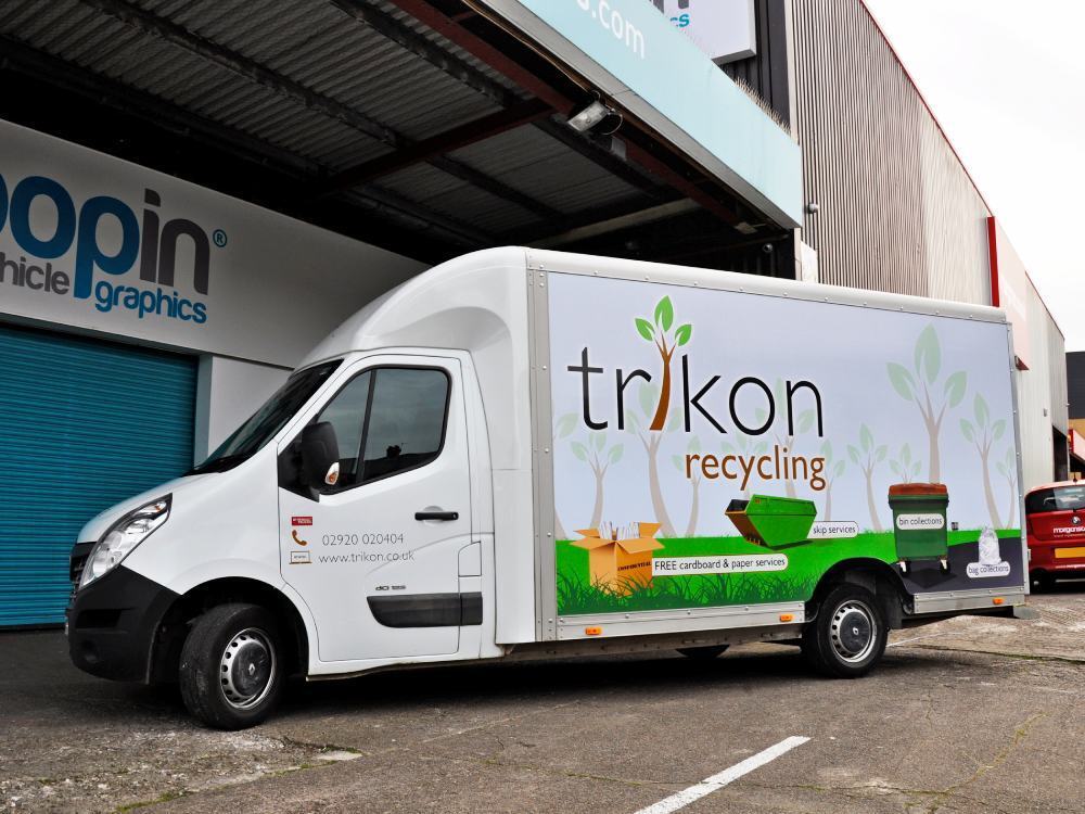 White Renault Master with company van wrap.