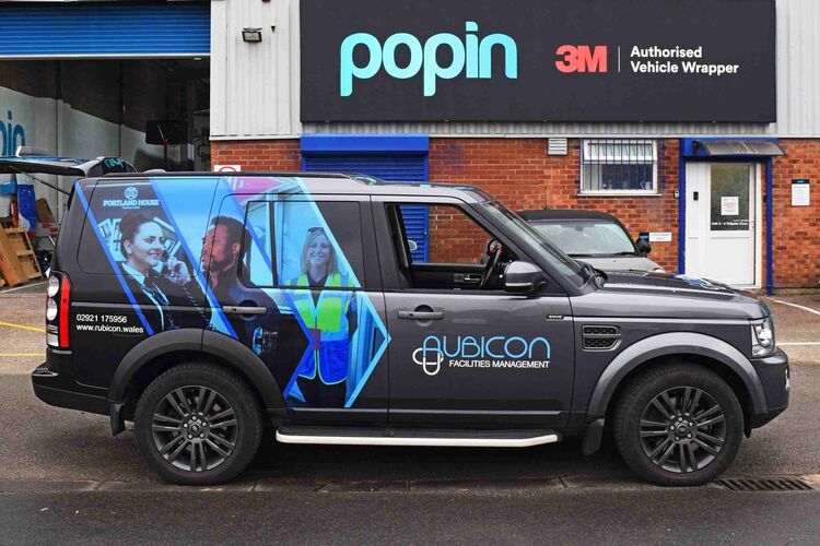 Partial wrap on a company Land Rover Discovery outside Popin Graphics in Cardiff.