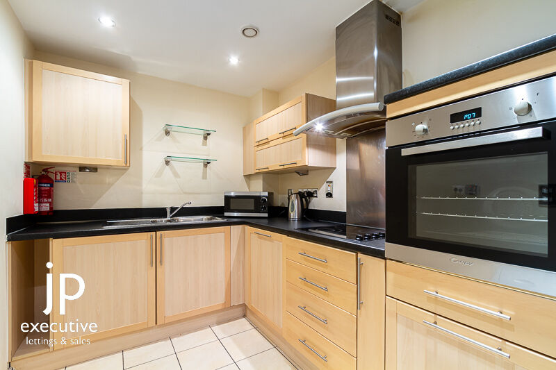 CENTURY WHARF CARDIFF BAY GROUND FLOOR UNFURNISHED TWO BEDROOM APARTMENT. 