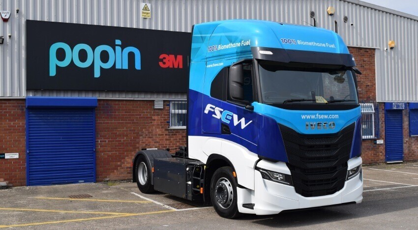 Lorry wrap and graphics on an Iveco lorry outside Popin in Cardiff.