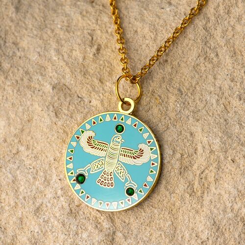 Round Pendant. The Persian Falcon.  Blue Turquoise with 3 Green Stones.