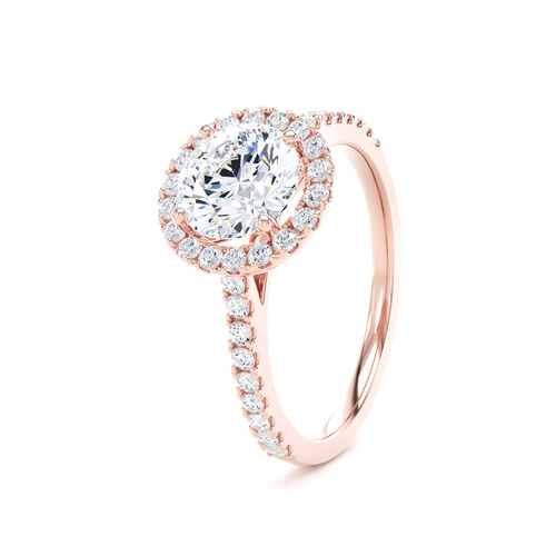 Round brilliant halo with diamond set shoulders