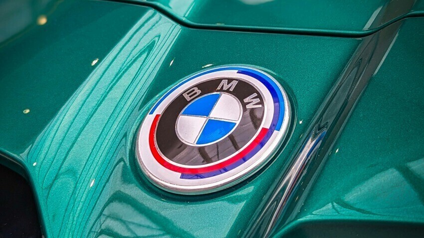 BMW motorsport badge on green race car