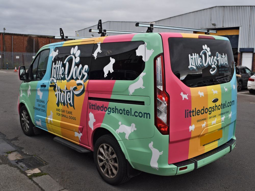 Little Dogs Hotel colourful company branded vehicle wrap on Ford Transit Custom van.