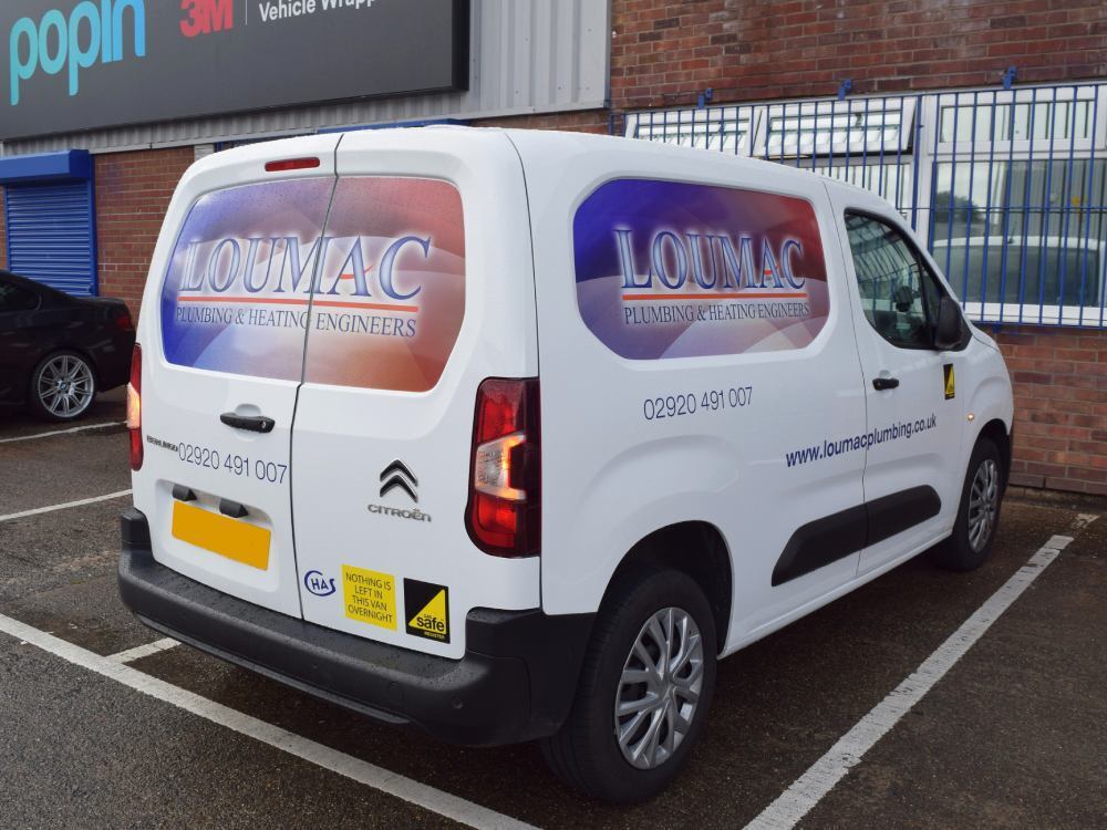 Company branded infilled panel graphics on a white Citroen Berlingo van.
