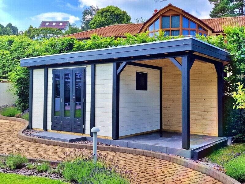 This image showcases a stylish Lugarde Pro-system garden outbuilding with a modern aesthetic, featuring a blend of wood and dark-painted trim. How can I assist you with it? Would you like suggestions for design improvements, material options, or ideas to enhance the space?