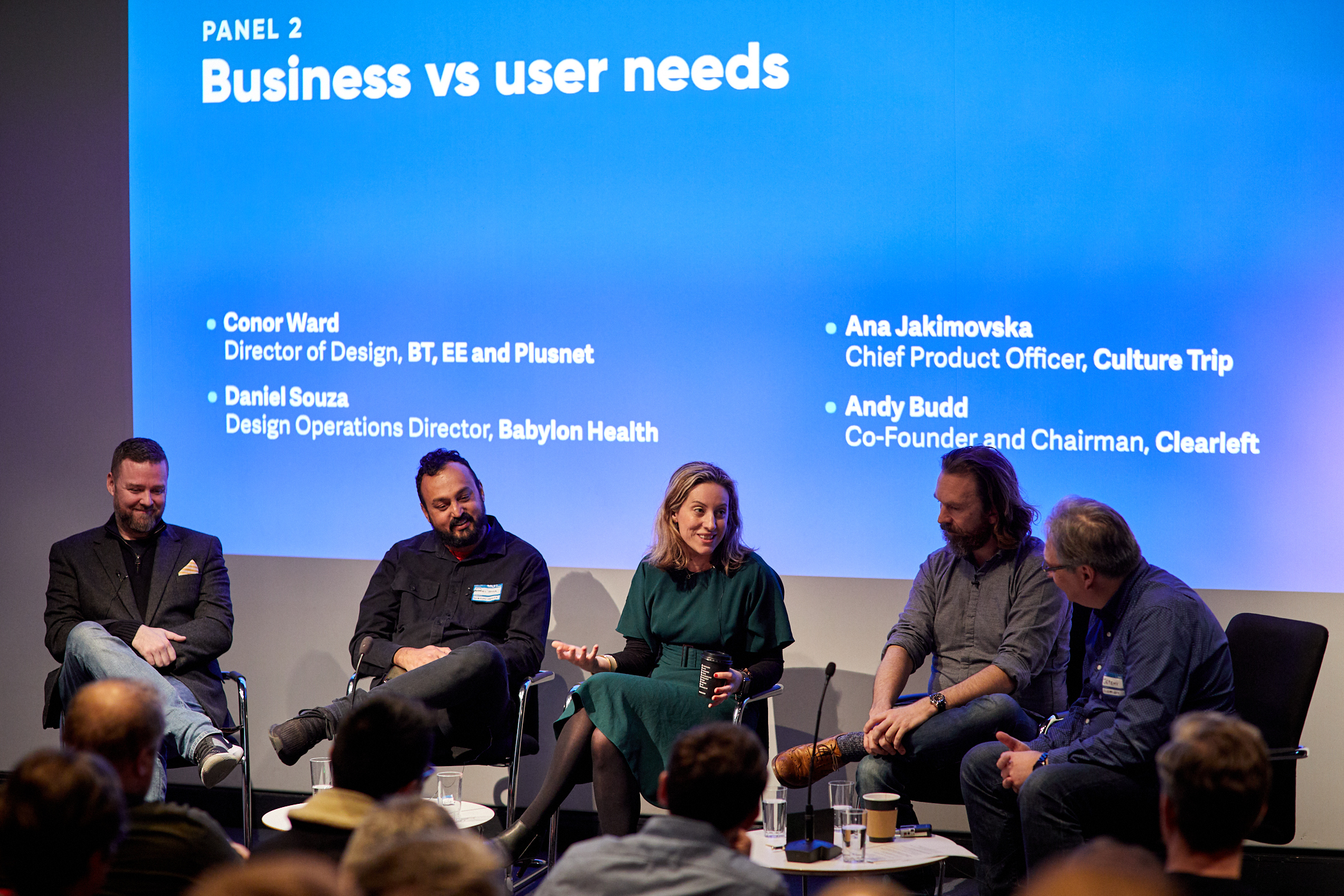Clearleft design leadership panel sitting infront of a blue screen