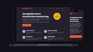 A mockup of a MacBook and an iPhone, each showing the top part of the new home page design. The white text and the orange logo and button stand out clearly against the dark blue background.