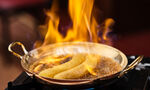 The Colony Grill Room Bananas Foster, Spiced Rum, Vanilla Ice Cream
