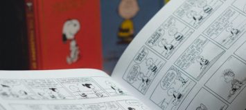 A Peanuts comic strip.