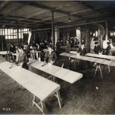Women workers painting wing sections at the Alliance Aeroplane Company Ltd, Cambridge Grove. | Hammersmith and Fulham Archives