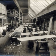 Women workers engaged in the construction of wing sections at the Alliance Aeroplane Company Ltd, Cambridge Grove. | Hammersmith and Fulham Archives
