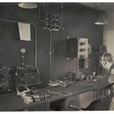 Receiving radio messages from the air from a blimp at Wormwood Scrubs.  | Hammersmith and Fulham Archives