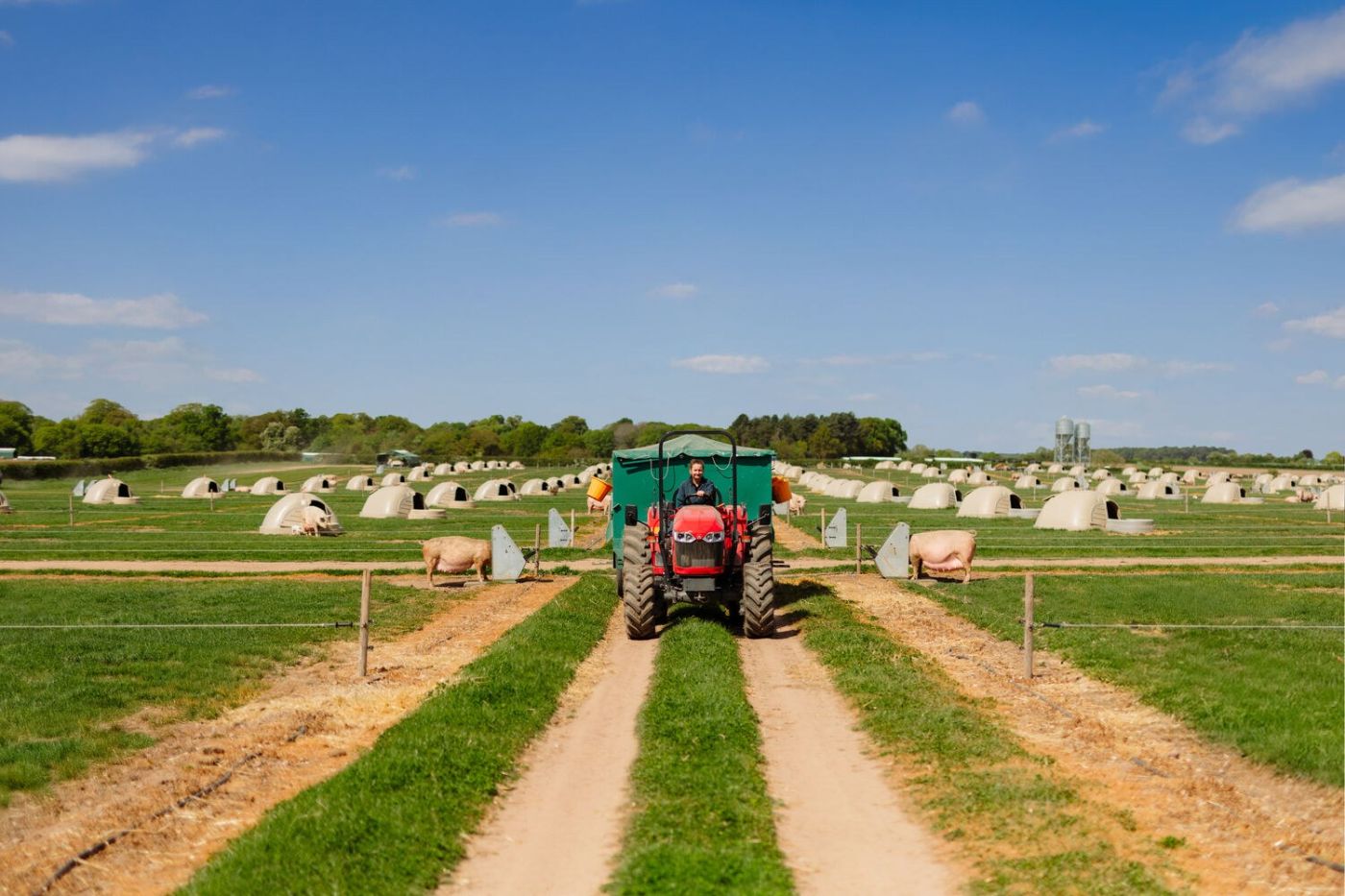 Large scale farm tractor greenhouses