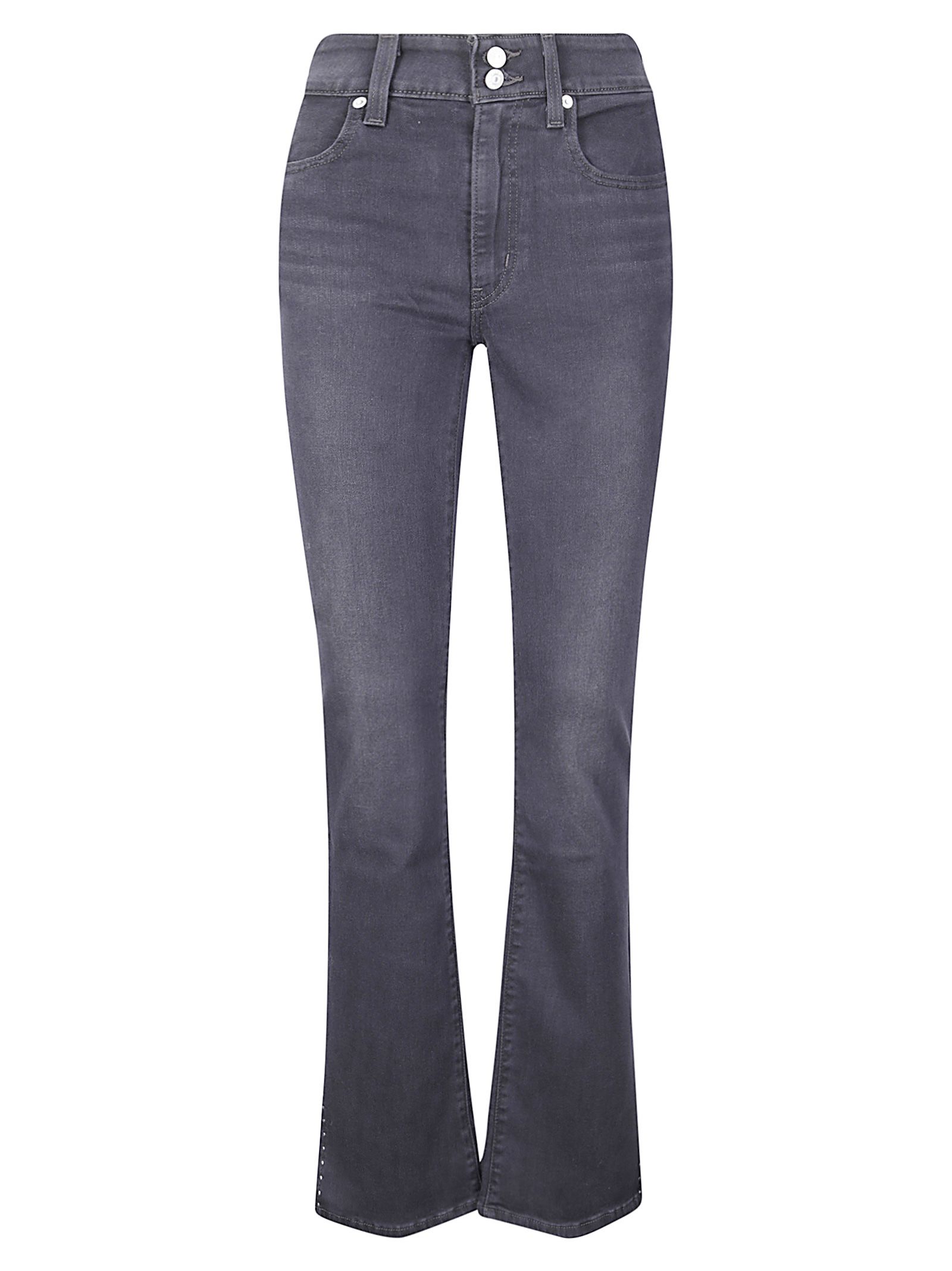Jeans 725 con tachuelas y bajo con abertura