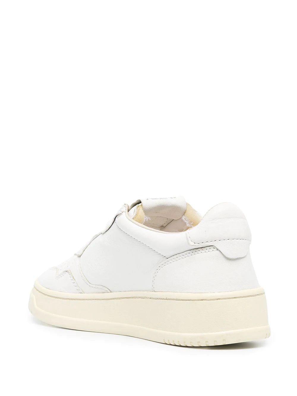 Women's AUTRY Sneakers  Shop AUTRY white leather sneakers for women. Classic design, flat sole and logo details.