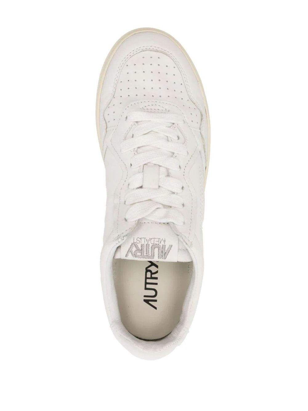 Women's AUTRY Sneakers  Shop AUTRY white leather sneakers for women. Classic design, flat sole and logo details.
