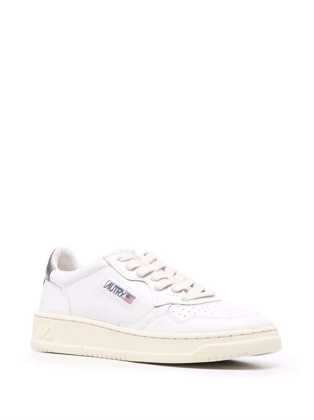 Women's Autry Sneakers  Stylish leather Autry sneakers with logo patches. Lace-up fastening and flat sole. White & silver.