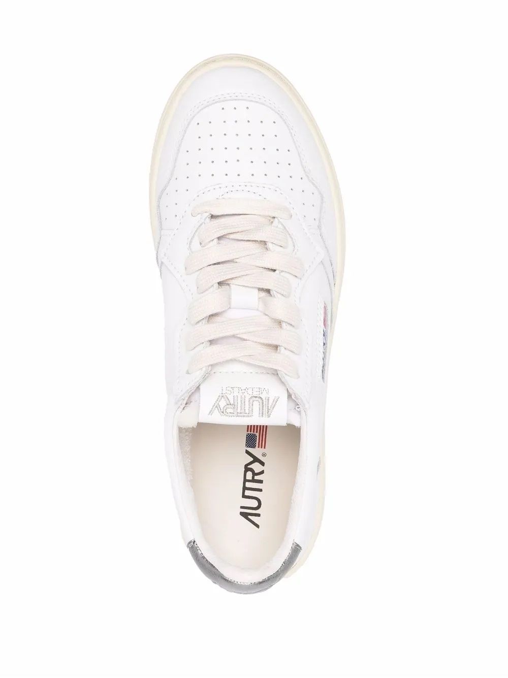 Women's Autry Sneakers  Stylish leather Autry sneakers with logo patches. Lace-up fastening and flat sole. White & silver.