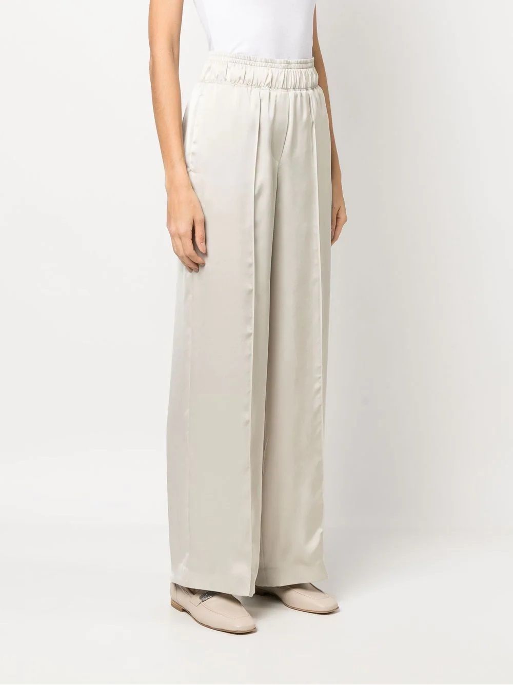 Women's Ivory Wide Leg Brunello Cucinelli Trousers Women's ivory wide leg trousers by BRUNELLO CUCINELLI. Elasticated waistband, pockets. 100% polyester.