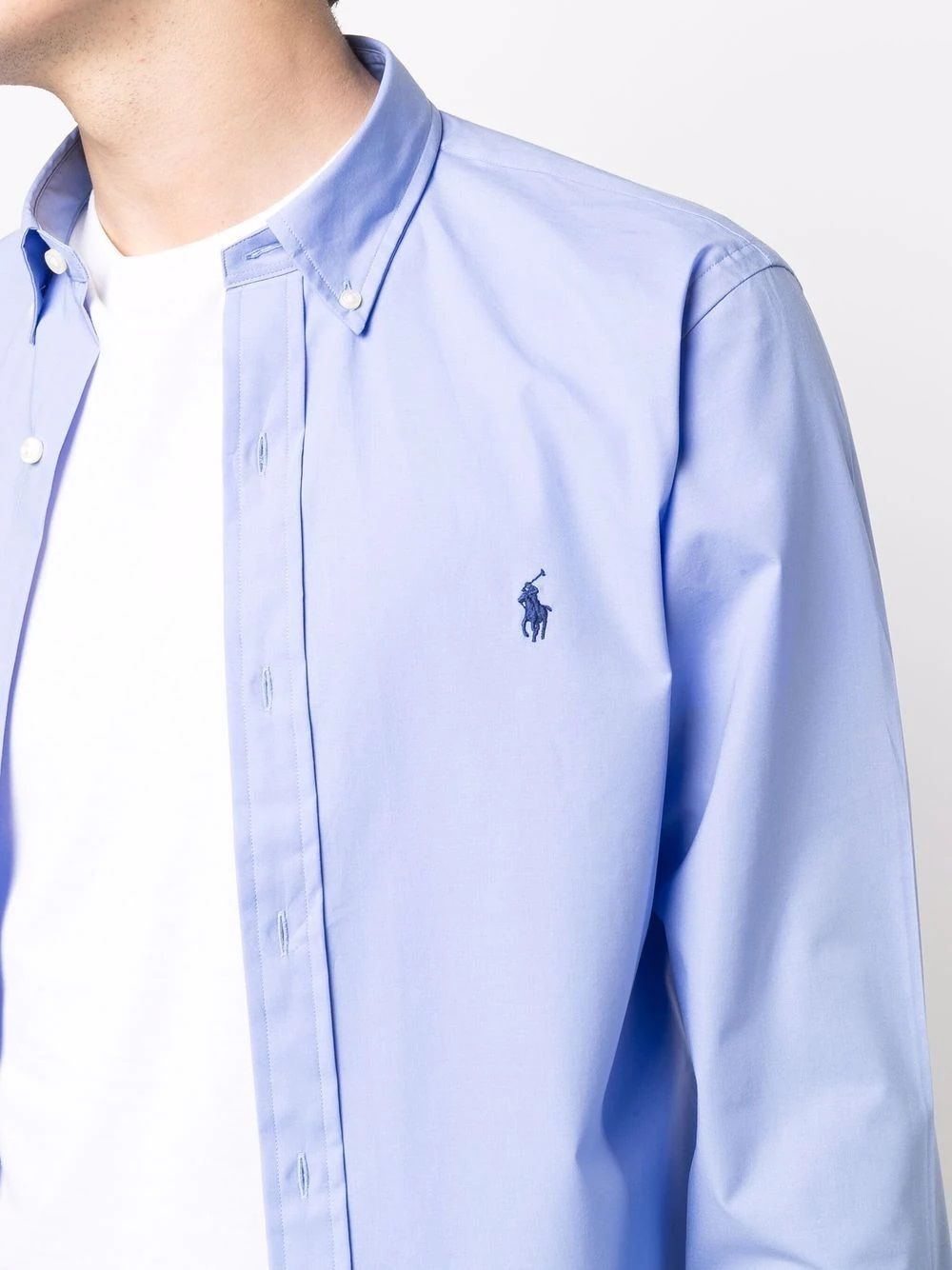 Ralph Lauren Shirt for man Upgrade your wardrobe with this classic blue cotton shirt from Ralph Lauren. Perfect for any occasion, this men's shirt features an embroidered logo, long sleeves, and a front button fastening. Made with 100% cotton, it's a must-have for any man's closet. From the CARRY OVER season, this shirt is composed of 91% cotton and 9% elastane for a comfortable fit. Shop now!