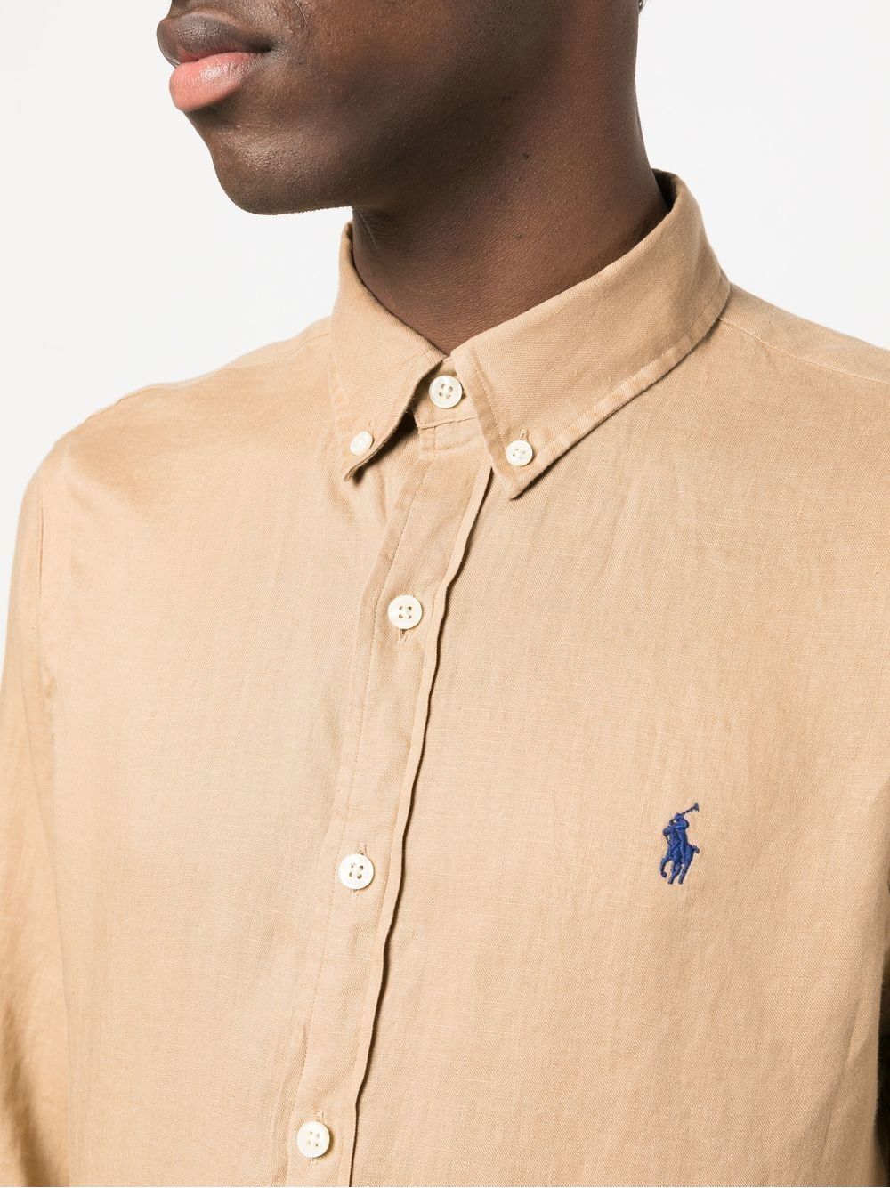 Ralph Lauren Linen Shirt for Men Upgrade your wardrobe with this classic Ralph Lauren linen shirt for men. Perfect for any occasion, featuring a logo print and front button fastening. Made with 100% linen for a comfortable and stylish fit. Available in light brown for a timeless look. From the CARRY OVER season.
