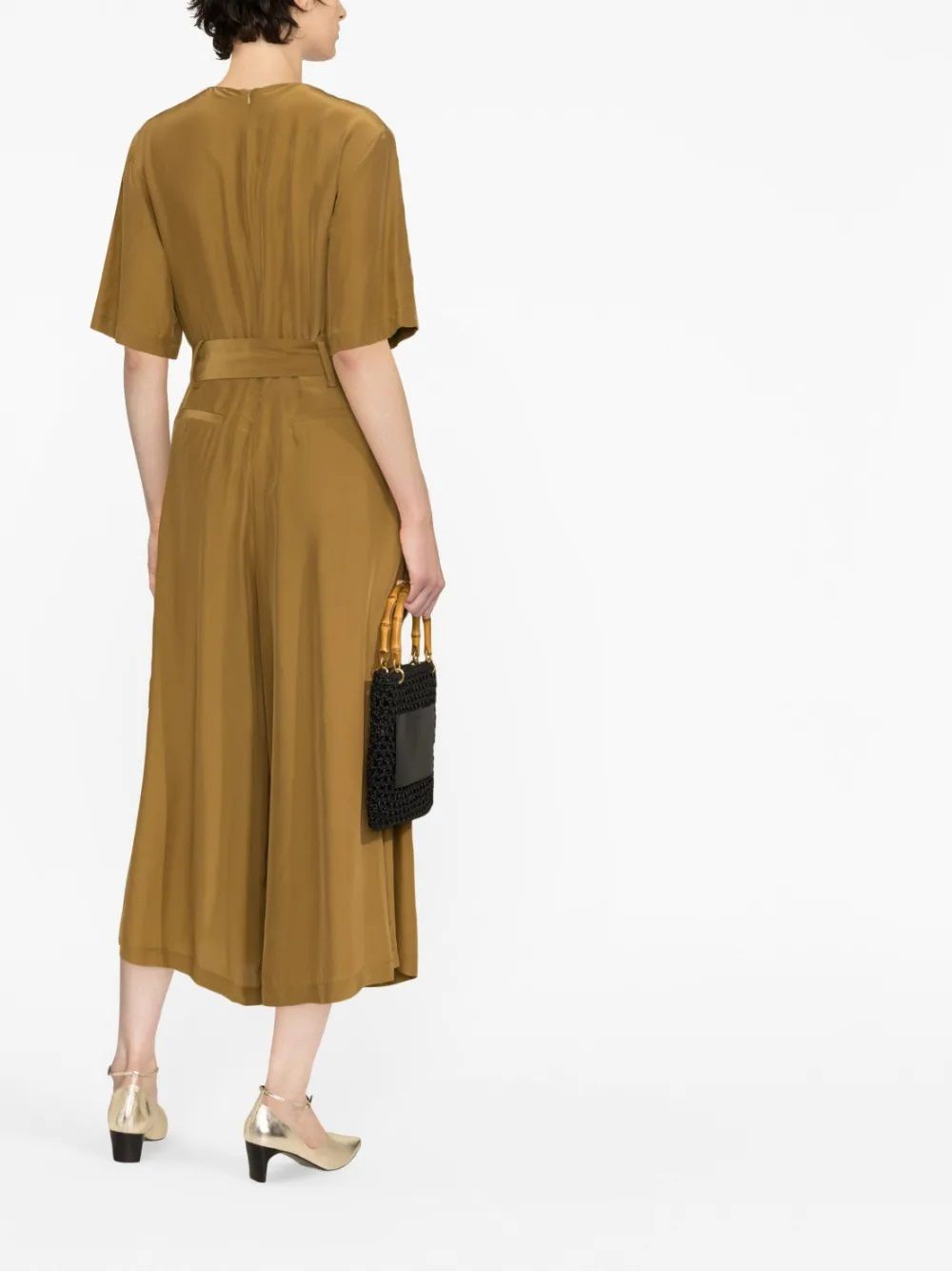 Fabiana Filippi Dress Upgrade your wardrobe with this chic Fabiana Filippi dress - round neck, short sleeves, and wide leg design. Made with 68% viscose and 32% silk, this caramel brown dress is perfect for any occasion. From the CARRY OVER season, this dress is a must-have from the FABIANA FILIPPI brand.