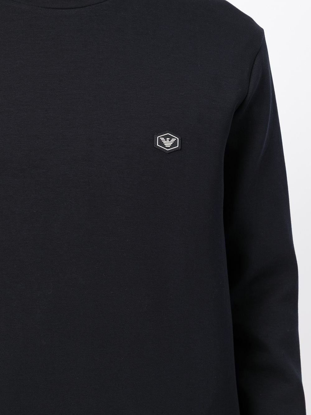 Men's Emporio Armani Sweatshirt  Stay warm in style with a men's Emporio Armani sweatshirt.
