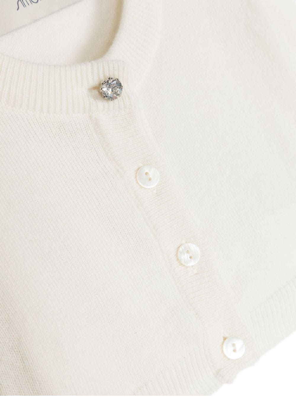 Cardigan in maglia SIMONETTA KIDS per bambini Cardigan da bambina in maglia di SIMONETTA KIDS. Morbido e confortevole per i bambini.