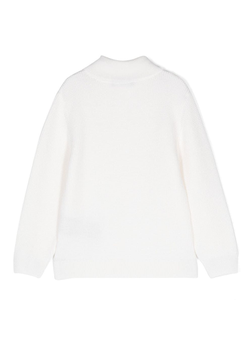 Balmain kids Maglione Rimani al caldo e alla moda con il nostro maglione Balmain Kids FW24. Realizzato al 100% in lana vergine, questo capo a maglia è perfetto per i ragazzi. Acquista ora!