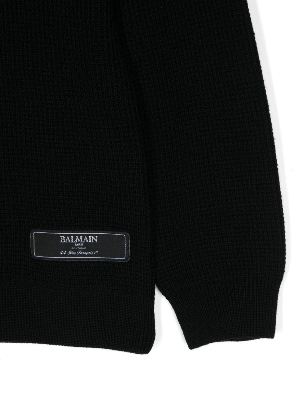 BALMAIN KIDS Boy's Knitwear Stay warm and stylish with our FW24 Balmain Kids Jumper. Made from 100% virgin wool, this knitwear is perfect for boys. Shop now!