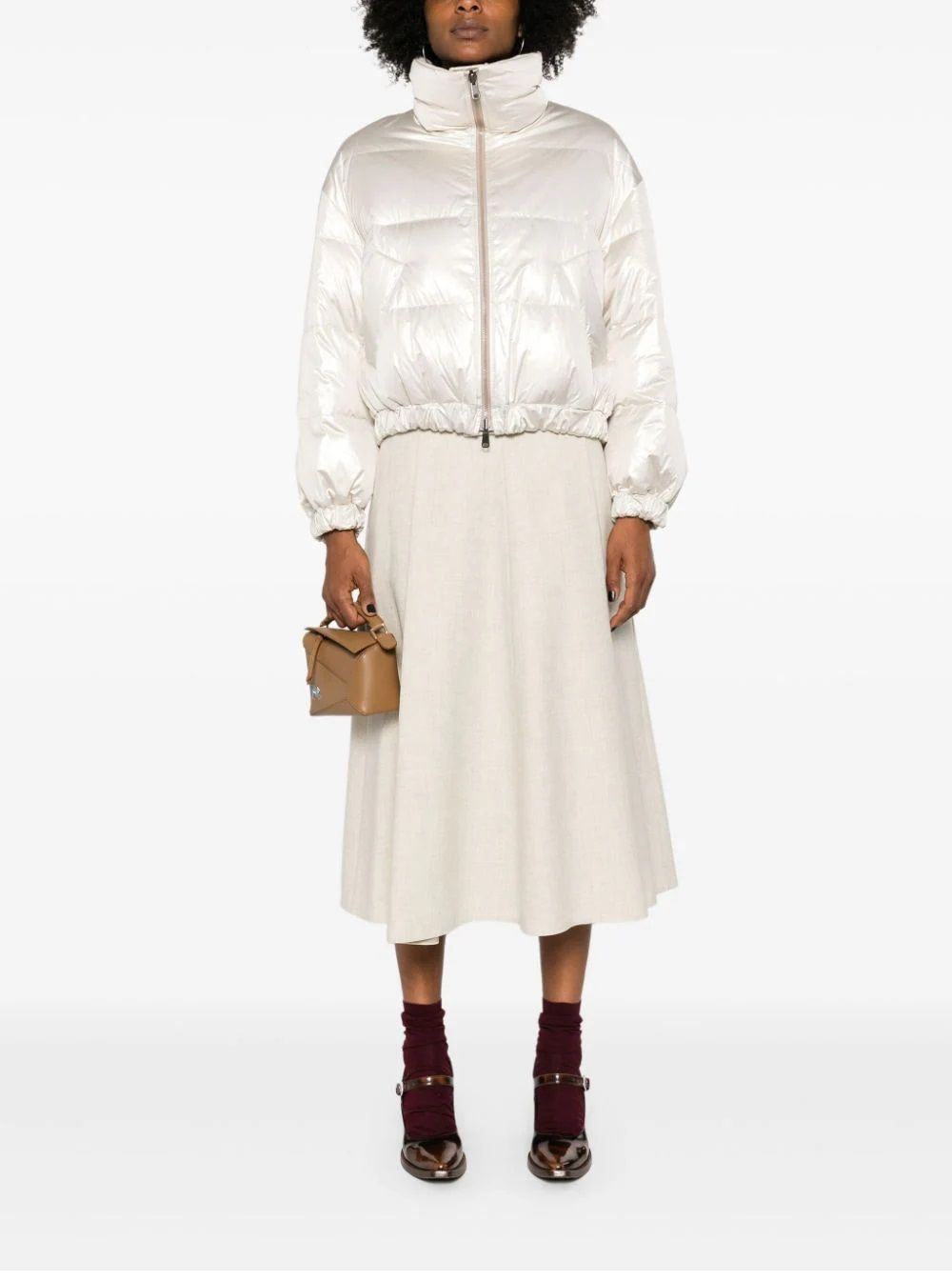 BRUNELLO CUCINELLI DOWN JACKET FOR WOMEN Stay warm and stylish this season with our reversible down jacket from Brunello Cucinelli. Made with a blend of 75%PL and 25%ME, this FW24 piece is perfect for the modern woman.