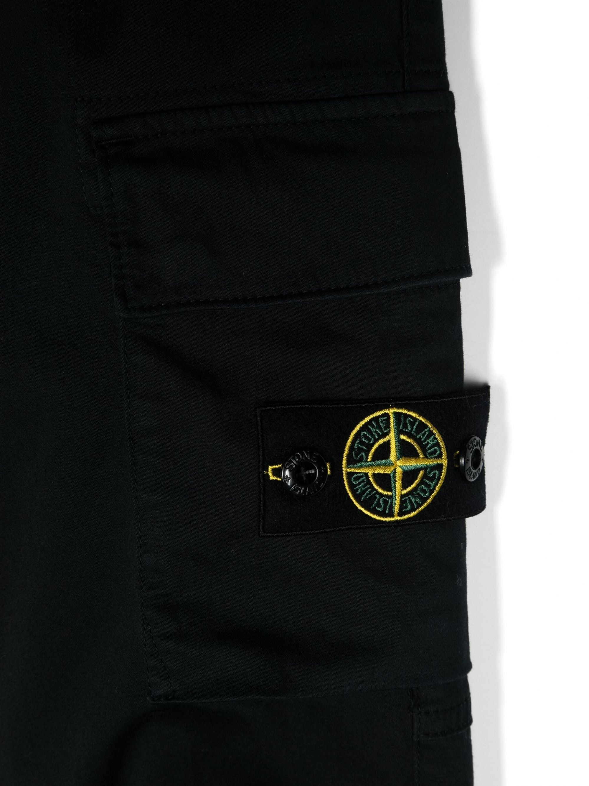 Stone Island Kids Regular Tapered Pants  Stylish and durable pants for boys from Stone Island Kids FW24 collection. Made with 98% cotton and 2% elastane for comfort and flexibility. Perfect for any occasion.