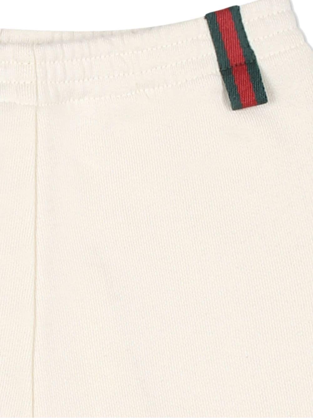 GUCCI KIDS PANTS  Stylish 100% cotton pants from GUCCI KIDS FW24 collection - perfect for any occasion. Shop now!
