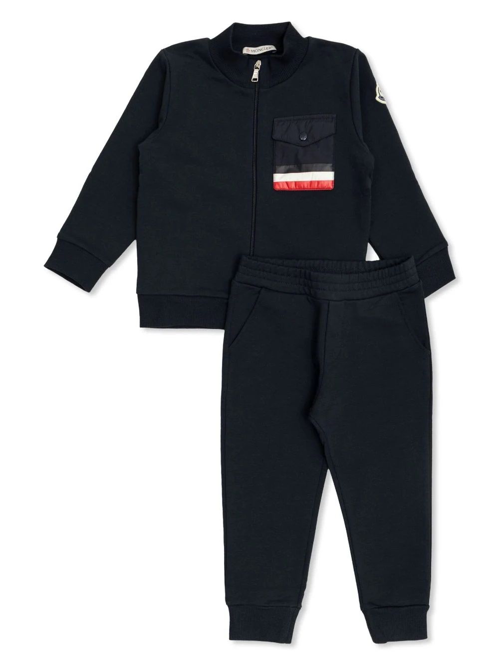 Moncler kids Completo in Maglia Elegante e accogliente tuta in maglia per bambini della collezione MONCLER KIDS FW24. Realizzata al 100% in poliestere per comfort e resistenza. Perfetta per ogni occasione. Acquista ora!