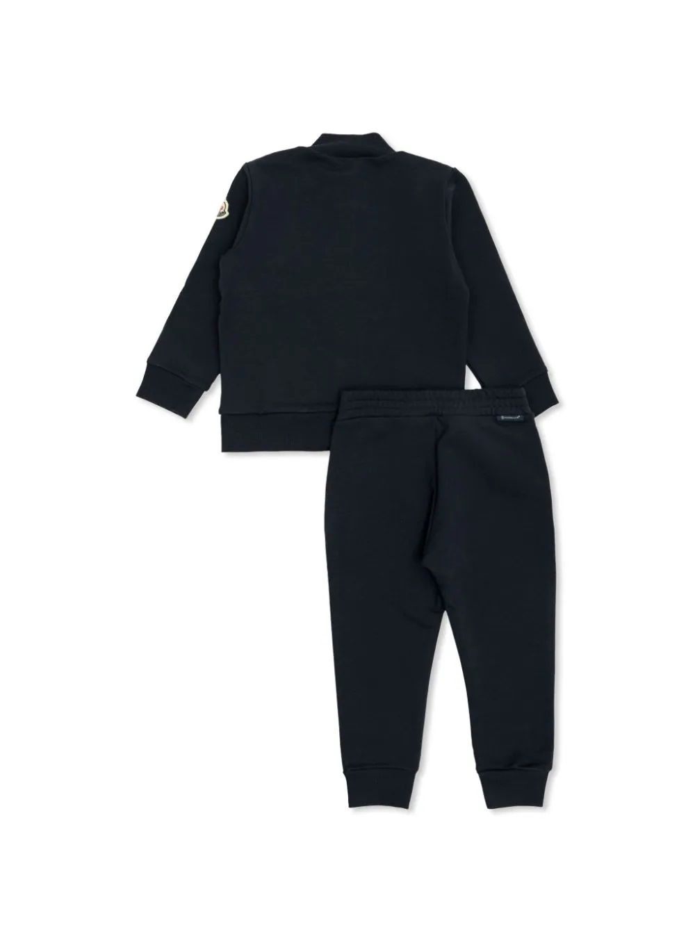 Moncler kids Completo in Maglia Elegante e accogliente tuta in maglia per bambini della collezione MONCLER KIDS FW24. Realizzata al 100% in poliestere per comfort e resistenza. Perfetta per ogni occasione. Acquista ora!