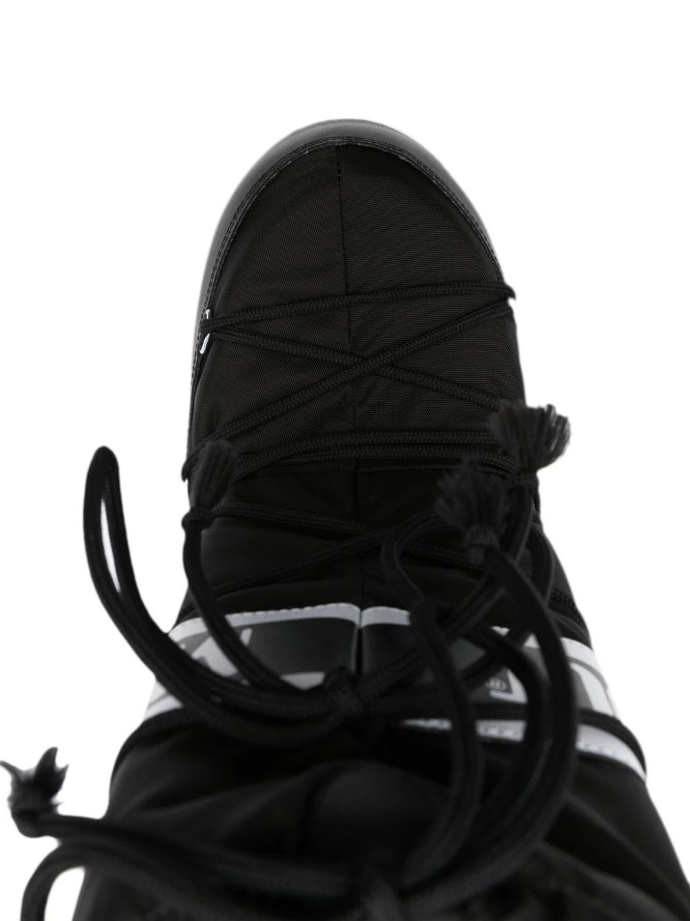 MOON BOOT MB ICON NYLON  Stay stylish and warm this season with MOON BOOT's FW24 Men's Boots. Made with durable polyamide and PVC for ultimate comfort. Shop now!