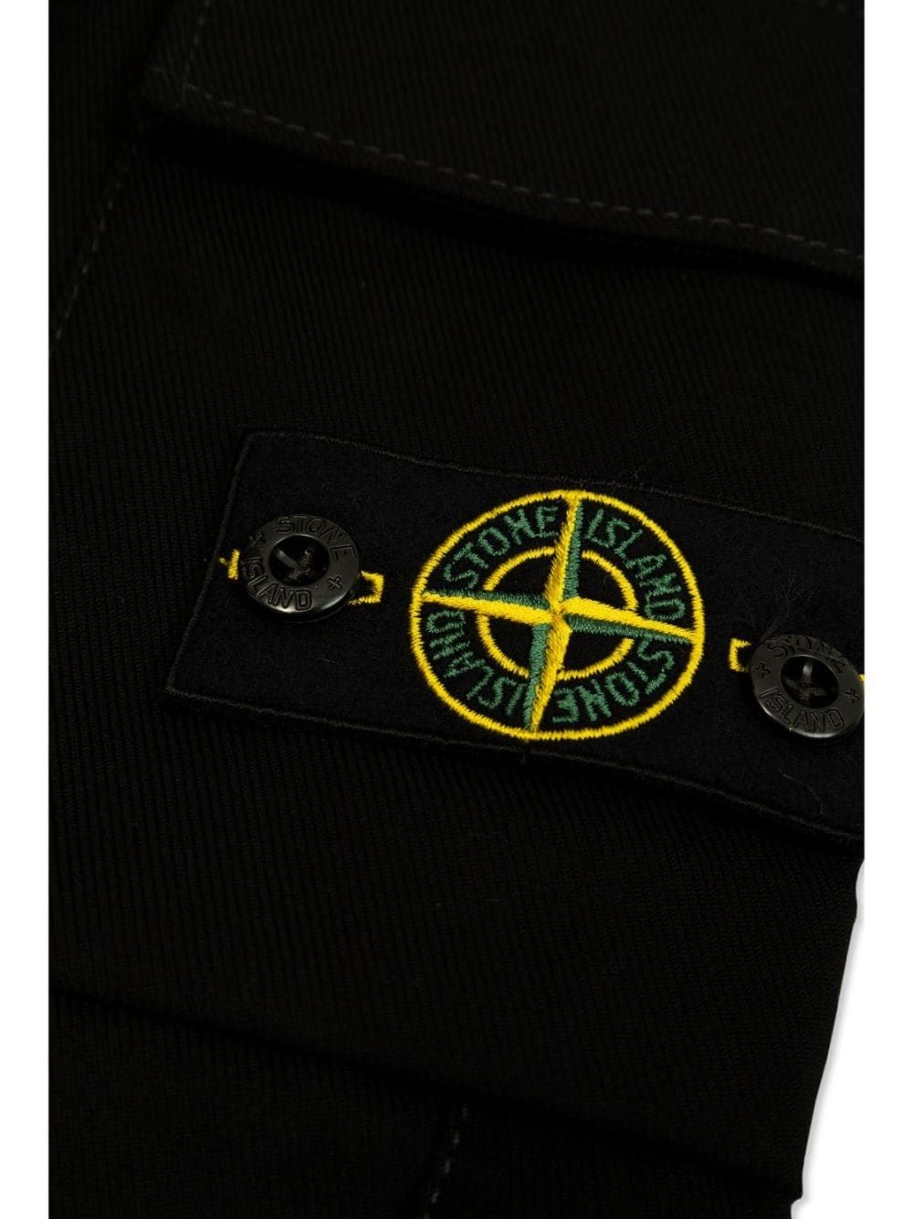 Stone Island Kids pants Stylish and durable pants for boys from Stone Island Kids FW24 collection. Made with 55% CO, 40% PA, and 5% EA for a comfortable fit. Shop now!
