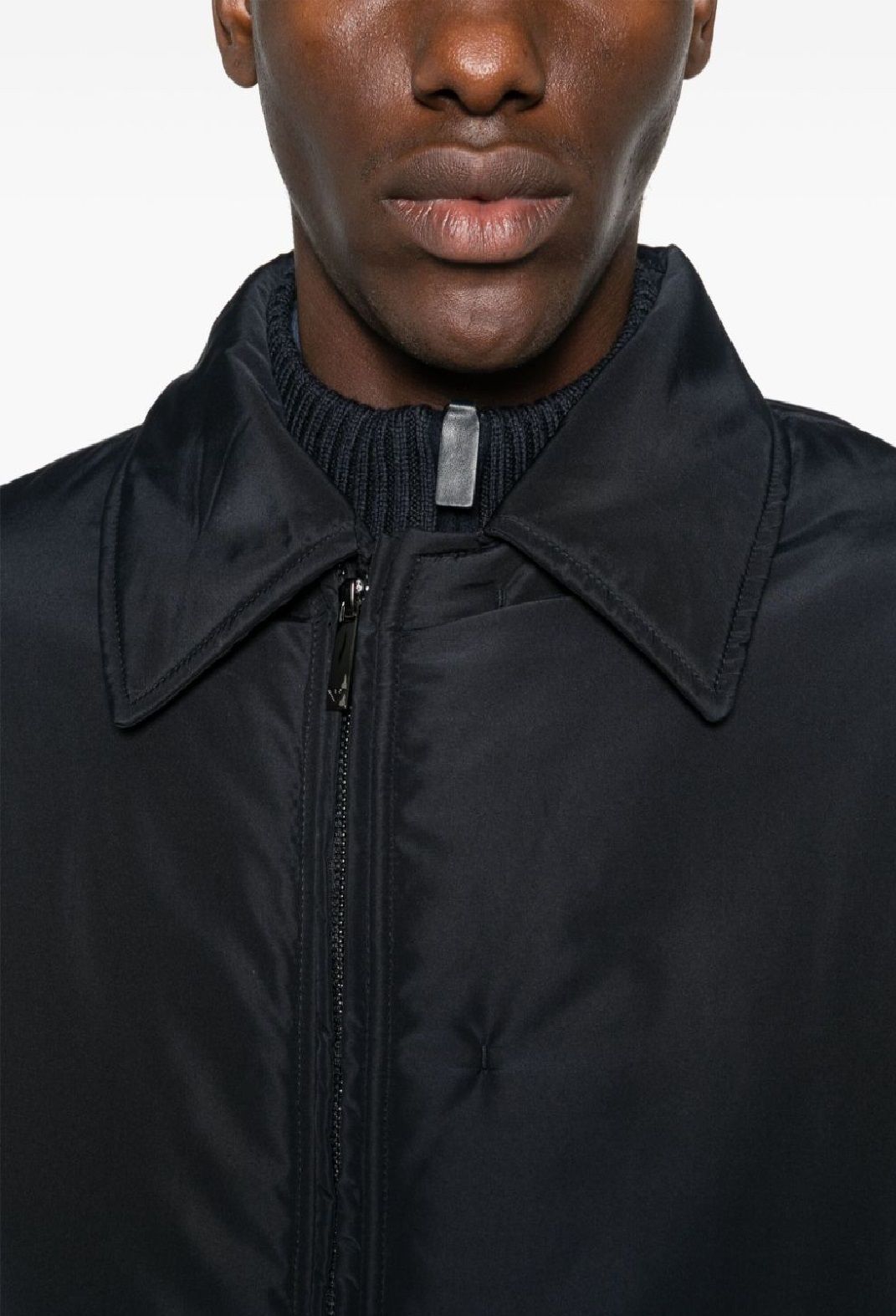 Emporio Armani CABAN Down Jacket  Stay warm and stylish this season with our Emporio Armani FW24 down jacket. Made with 100% polyester, it's the perfect addition to any man's wardrobe. Shop now in our clothing - down jackets category.