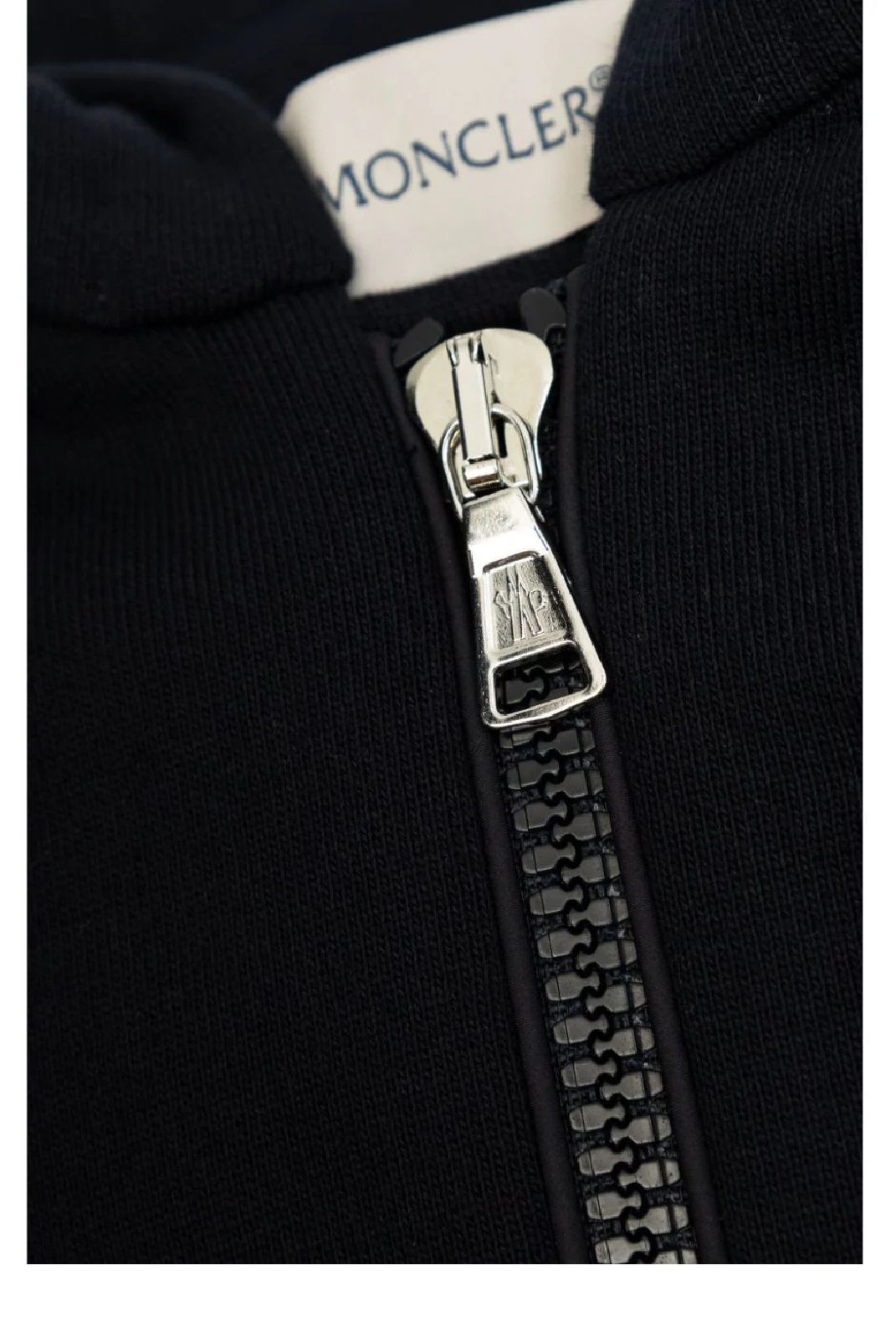 Moncler Kids Zip Up Cardigan  Stay warm and stylish with this Moncler Kids FW24 cardigan. Made from 100% polyester, it's perfect for chilly days. Shop now!