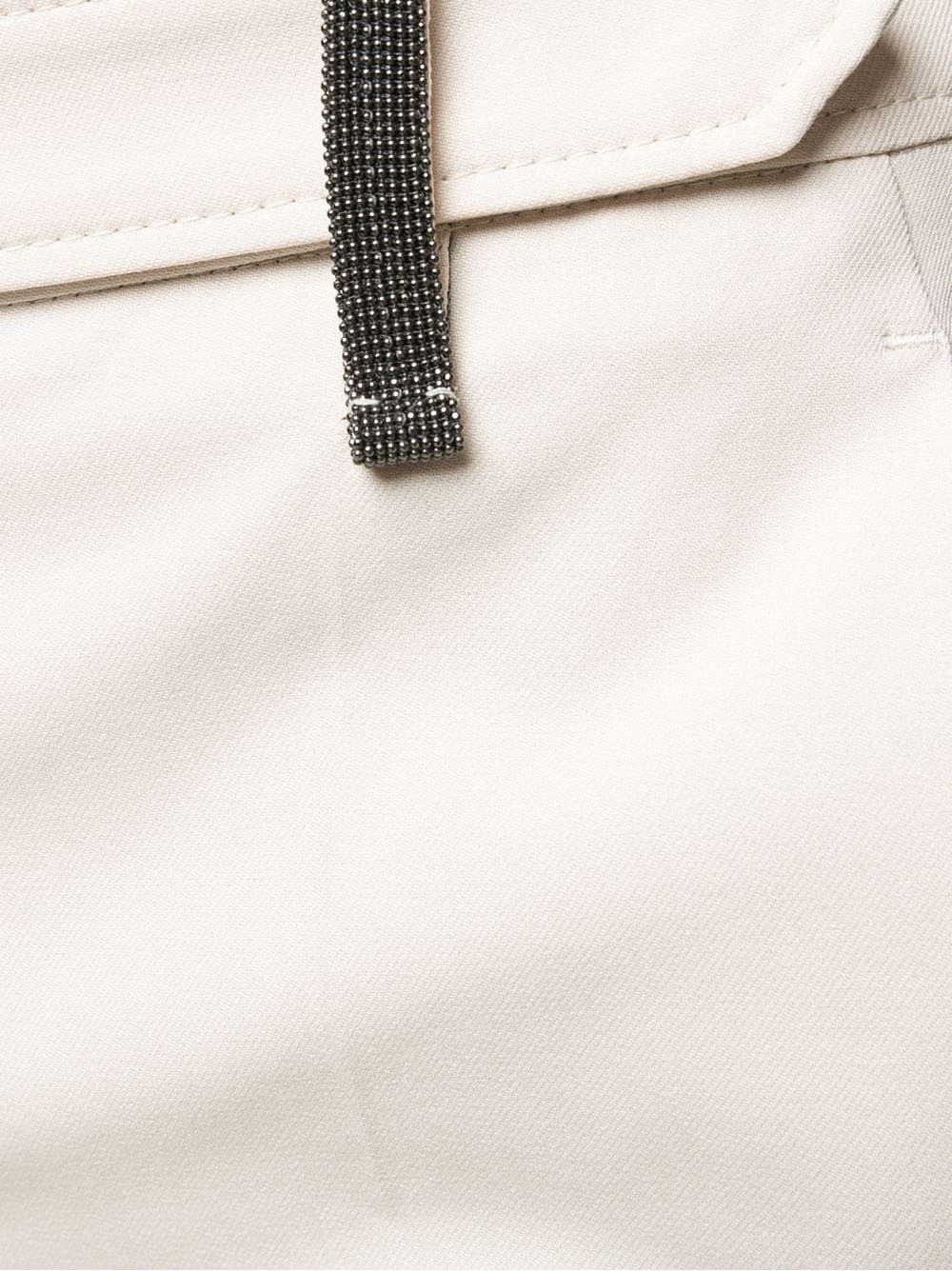 Women's BRUNELLO CUCINELLI Tapered Cigarette Trousers Elegant BRUNELLO CUCINELLI cigarette trousers for women. Tapered fit, regular length.