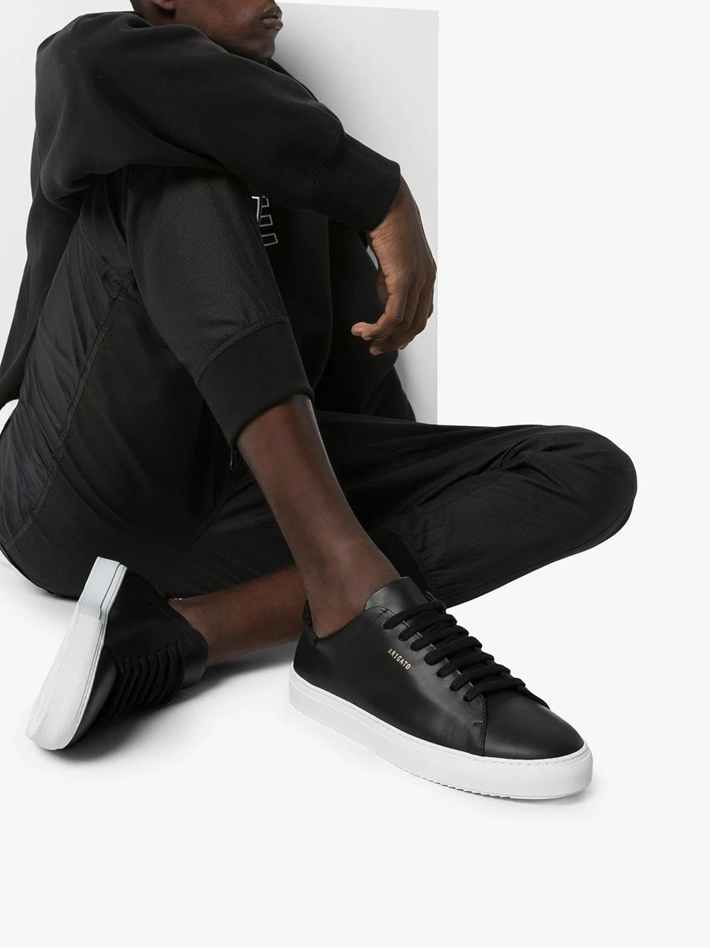 AXEL ARIGATO CLEAN 90 SNEAKERS for Men Upgrade your sneaker game with Axel Arigato's Clean 90 in black leather. Perfect for the modern man. Shop now!