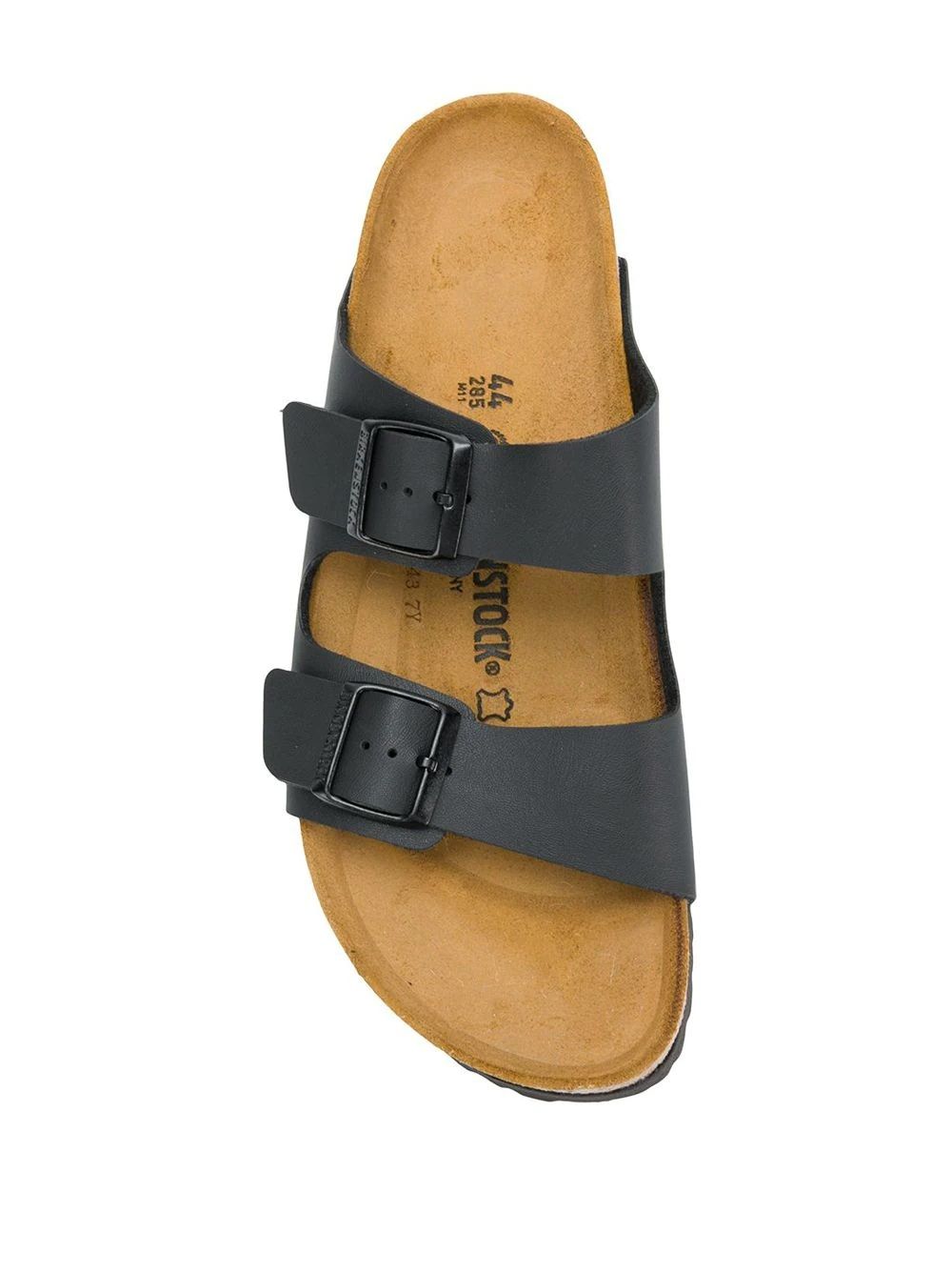 Birkenstock Arizona Sandals  Stylish black leather Birkenstock Arizona sandals w/ buckle for a comfortable fit.