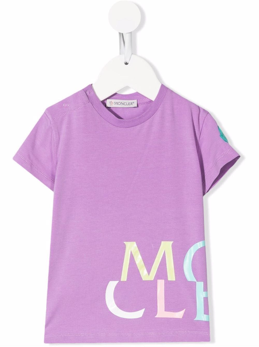 Maglietta Moncler bambina - 95% CO 5% EA T-shirt Moncler bambina: maniche corte, 95% CO 5% EA, jersey con logo sul petto.