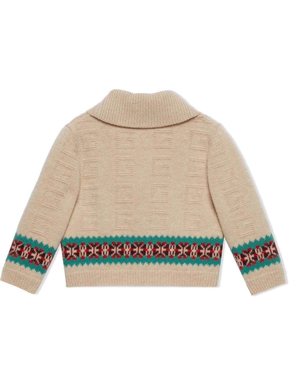 Kids Gucci Cardigan: Revers, Shawl, Buttons, Beige/Multicolor Stylish Gucci Kids cardigan featuring revers, shawl, buttons, and beige/multicolor.