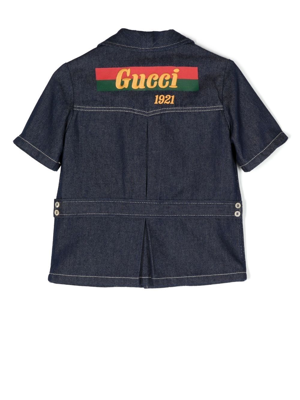 GUCCI KIDS Shirt  Upgrade your little boy's wardrobe with this stylish GUCCI KIDS Indigo Shirt. Featuring a unique web print and button closure, this short sleeve shirt is perfect for any occasion. Made with a blend of high-quality materials, it offers both comfort and style. From the CARRY OVER season, this shirt is a must-have for any fashion-forward kid. 74%CO 26%CANAPA composition.