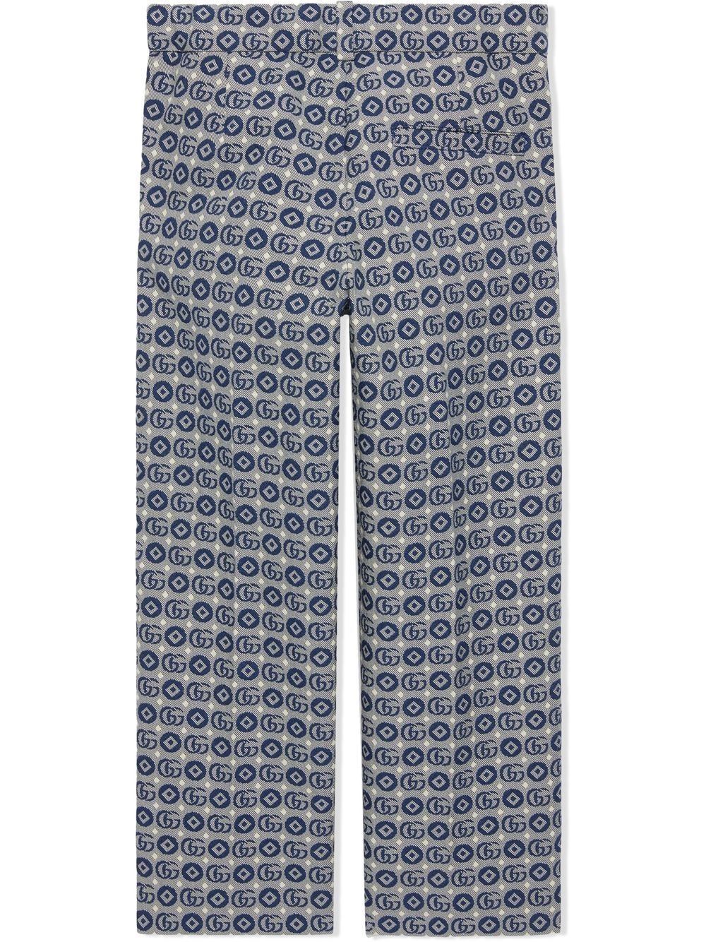 GUCCI KIDS Trousers Upgrade your little one's wardrobe with these stylish GUCCI KIDS trousers in blue/grey. Made with a straight cut and featuring a button closure, passers-by, and two side pockets. Perfect for any occasion. From the CARRY OVER season. 53%CO 47%PL composition.