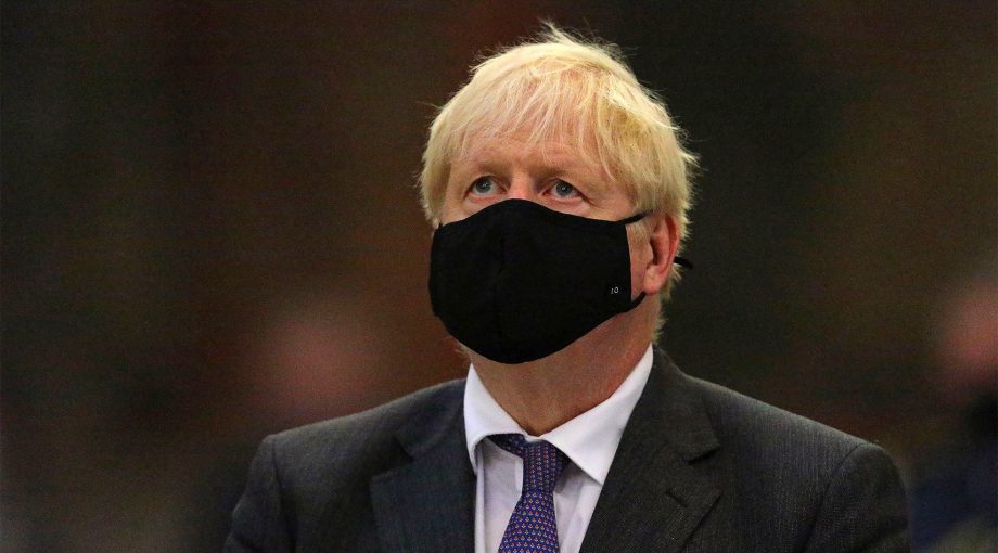 Boris Johnson Brexit corona mondkapje