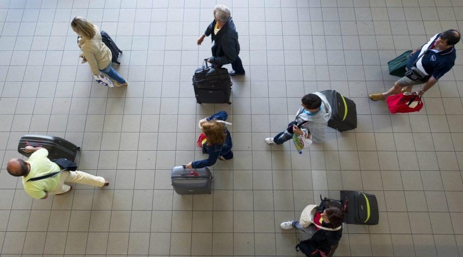 Reizigers corona angst schiphol nieuws virus doets reizen
